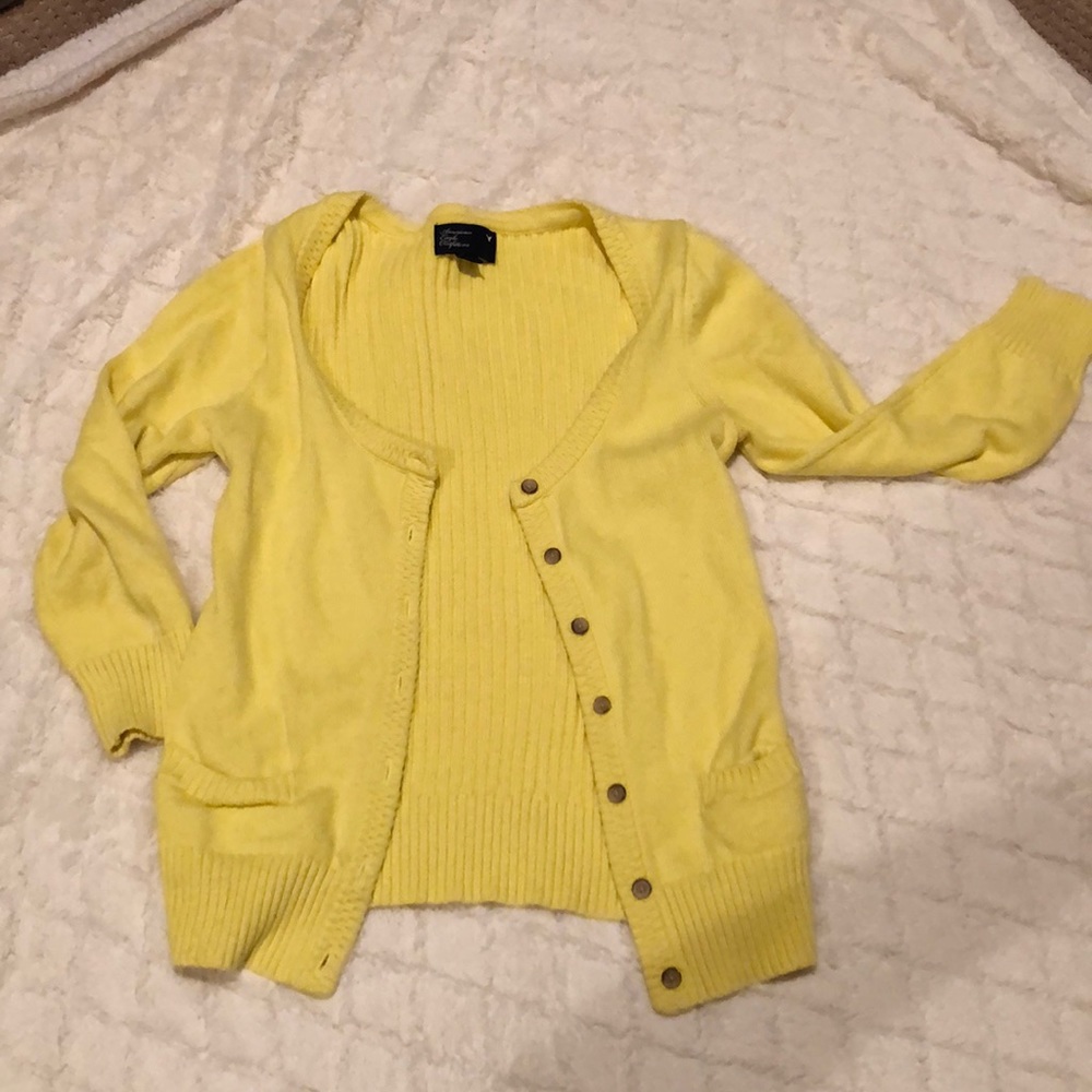 yellow cardigan